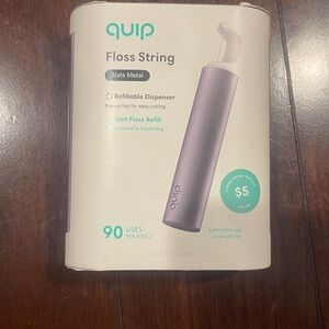 Quip Slate Metal Floss String refillable dispenser. In original packaging.